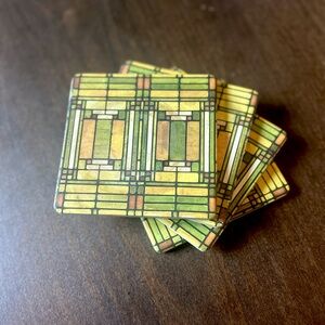 set of 4, 4.25” square coasters by Frank Lloyd Wright, currently selling new $26